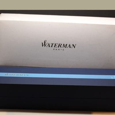 A blue box with the word waterman on it.